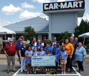 Car-Mart of Bryant presents check to Boys and Girls Club
