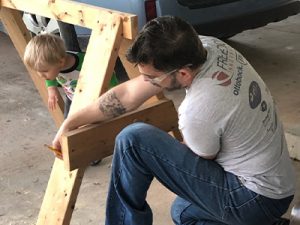 Josh woodworking with his son