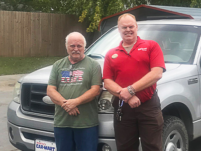 Keith Abbott and Dennis Hurley, GM at Car-Mart of Morrilton