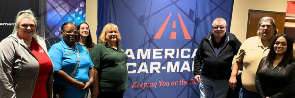 Car-Mart Associates posing for a picture at Junior Achievement Oklahoma event