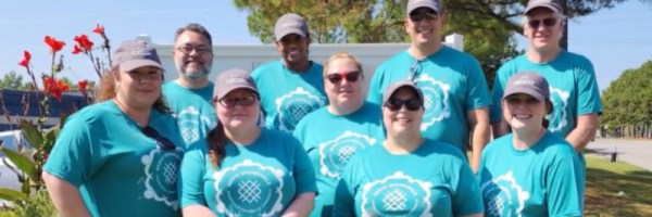 Car-Mart Associates posing for camera at Serve Springdale Community Involvement in Springdale, Arkansas