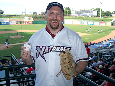 Dustin after throwing out the first pitch at an Arkansas Naturals baseball game