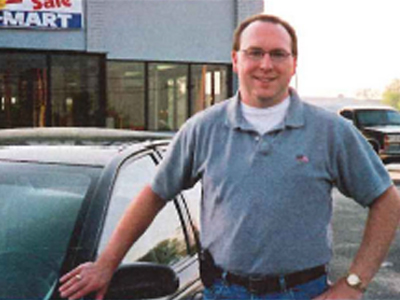 Dustin Southard in at a Car-Mart dealership in 2002