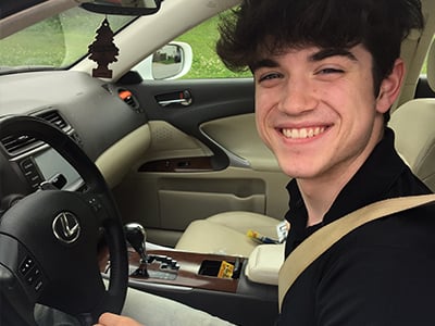 Will's son sitting in his new Lexus