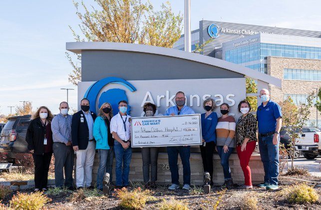 Car-Mart Corporate Office team presenting check to Arkansas Children’s Northwest Hospital check