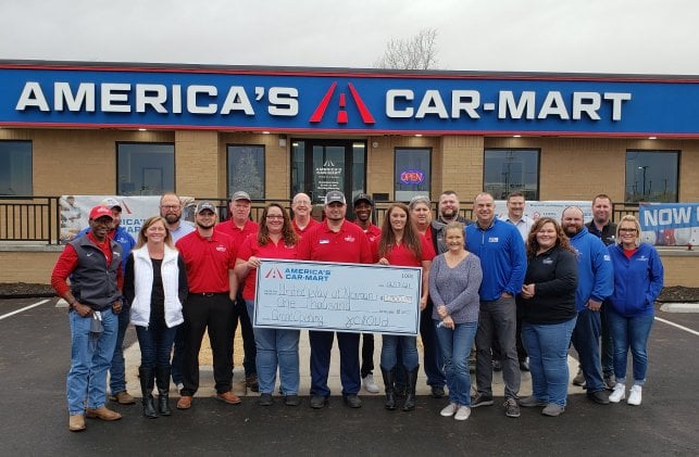 America’s Car-Mart of Norman, Okla., presenting check to the United Way of Norman