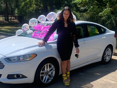 Shelli Carlson's daughter, Dashia, with her new car