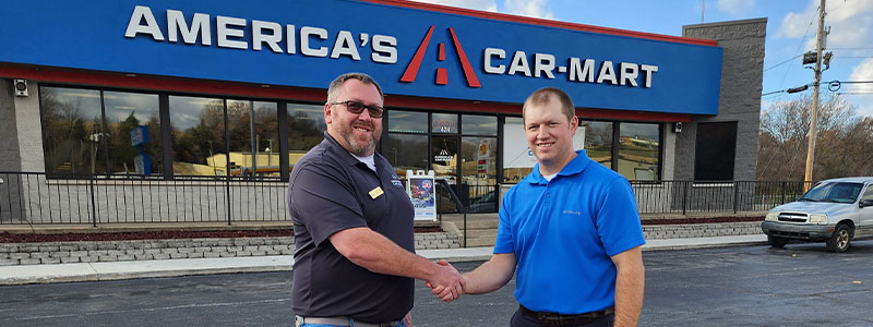 Zach Massey Shred-it employee and Larry Stone General Manager at Car-Mart of Harrison