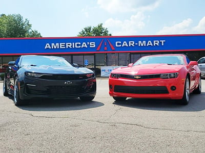 Dawson purchased his red Camaro at Car-Mart of Benton, Ark. to match his Dad David’s black Camaro