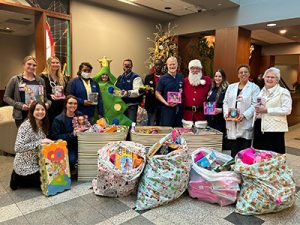 America's Car-Mart associates deliver toys to CHRISTUS St. Michael Hospital in Texarkana, Texas.