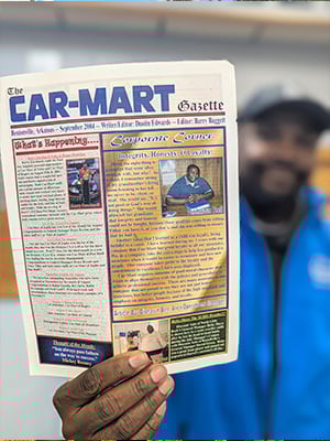 General Manager of Car-Mart Conway Dishawn Bell holding company Gazette magazine.